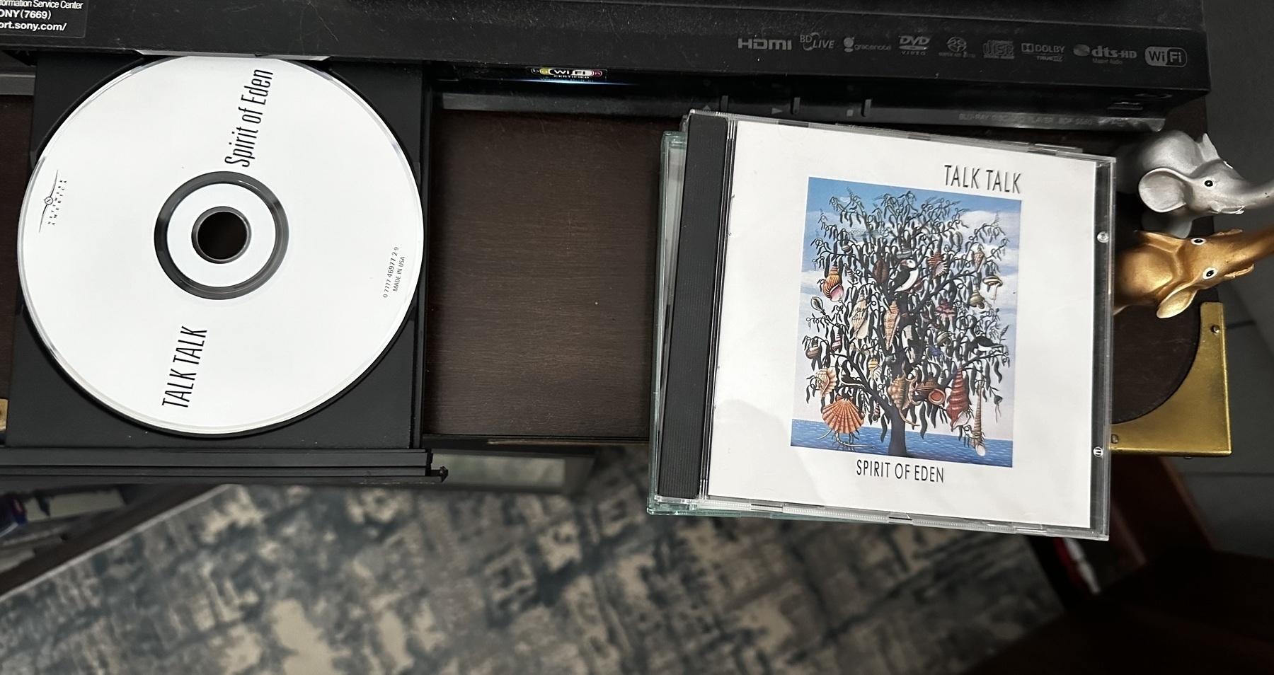 Spirit of Eden 💿 in the tray of a Blu-ray player. The 💿 jewel case is nearby. 