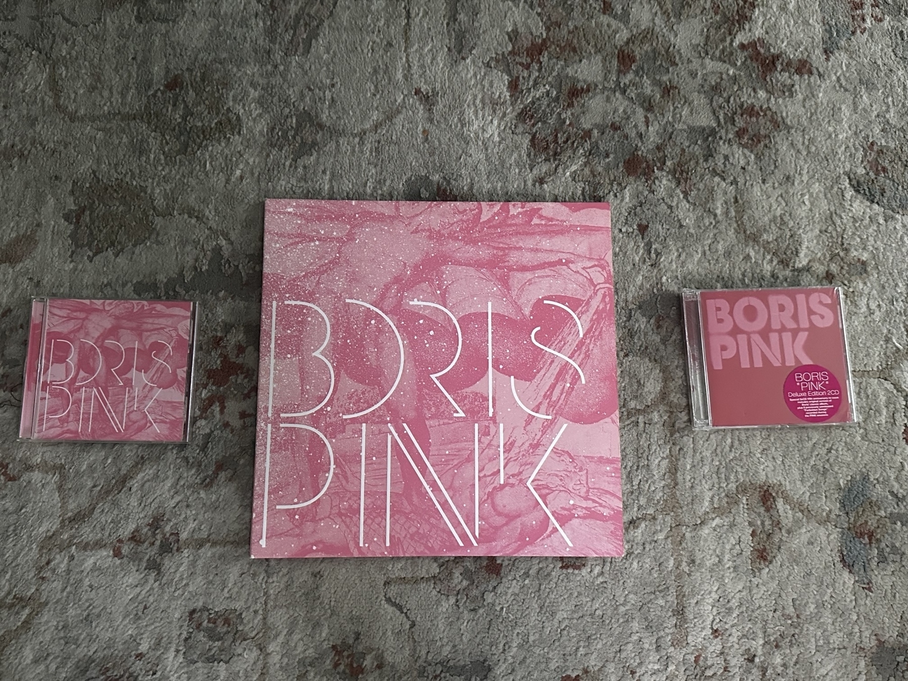 Pink album by Boris in theee different versions—CD, LP, and deluxe CD