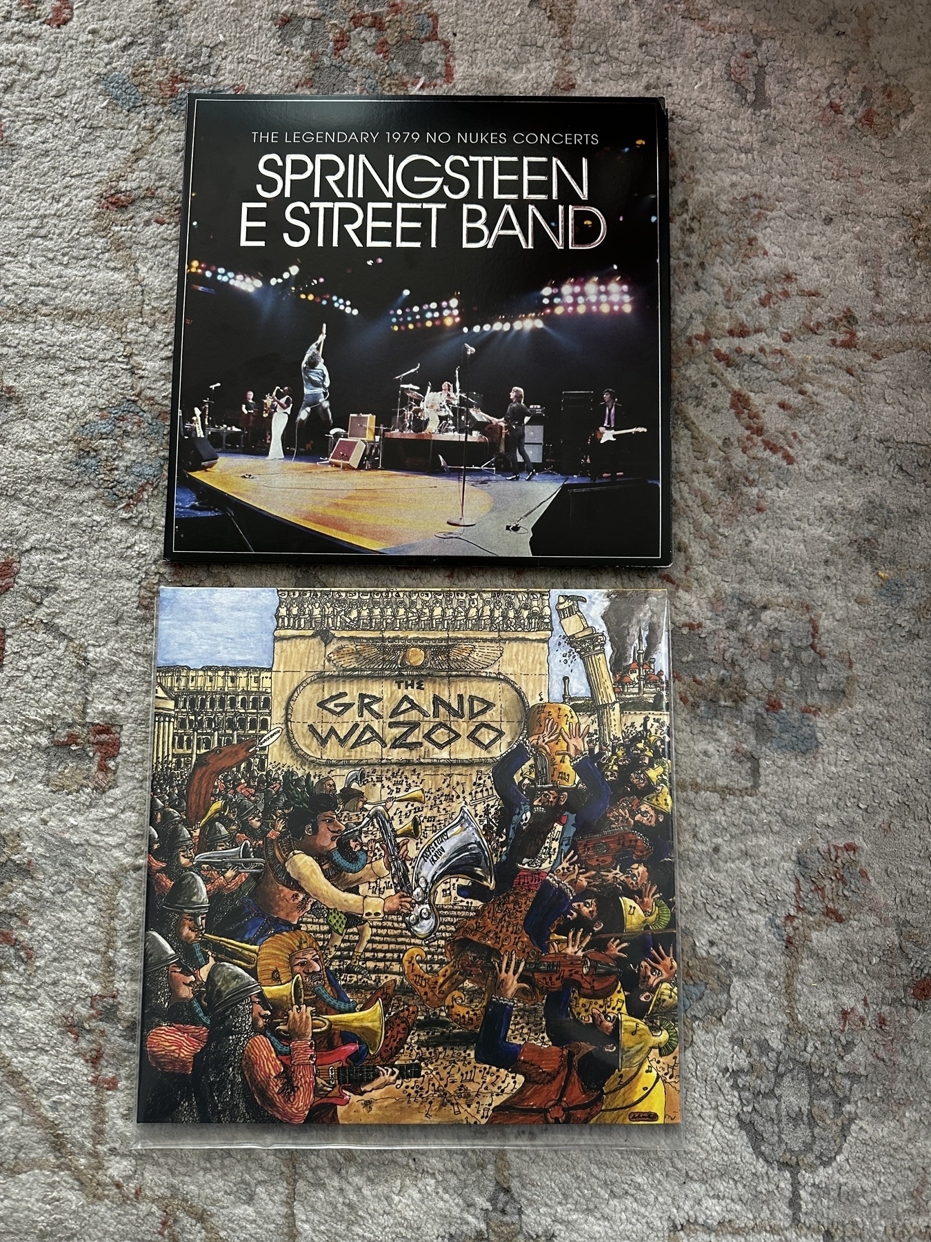 The Legendary No Nukes Concert by Bruce Springsteen and the E Street Band and The Grand Wazoo by Frank Zappa, both on vinyl LPs